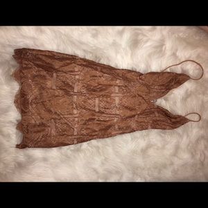 Tight tan lace dress